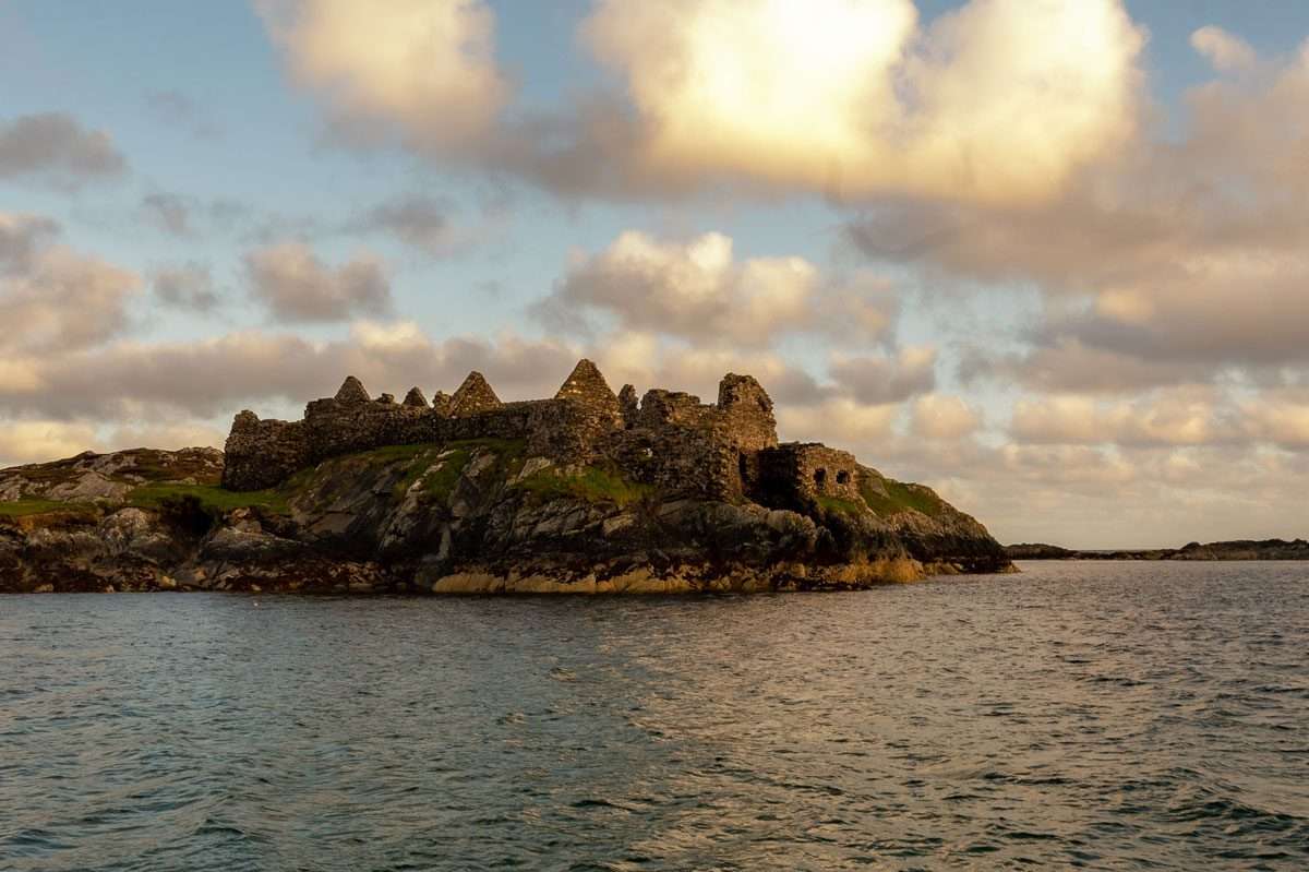 View of old ruin on an island on the Round IRL with Wild West Sailing